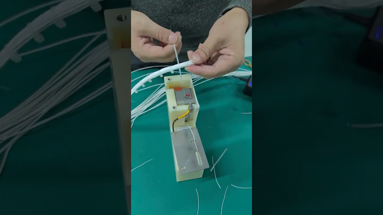 高效自动扎带机替代人工捆扎和切割批量线束